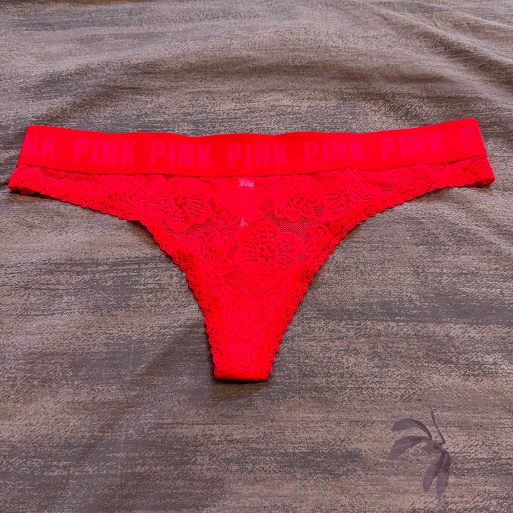 VS Pink red lace thong. Size large. Excellent condition. Elastic logo band.